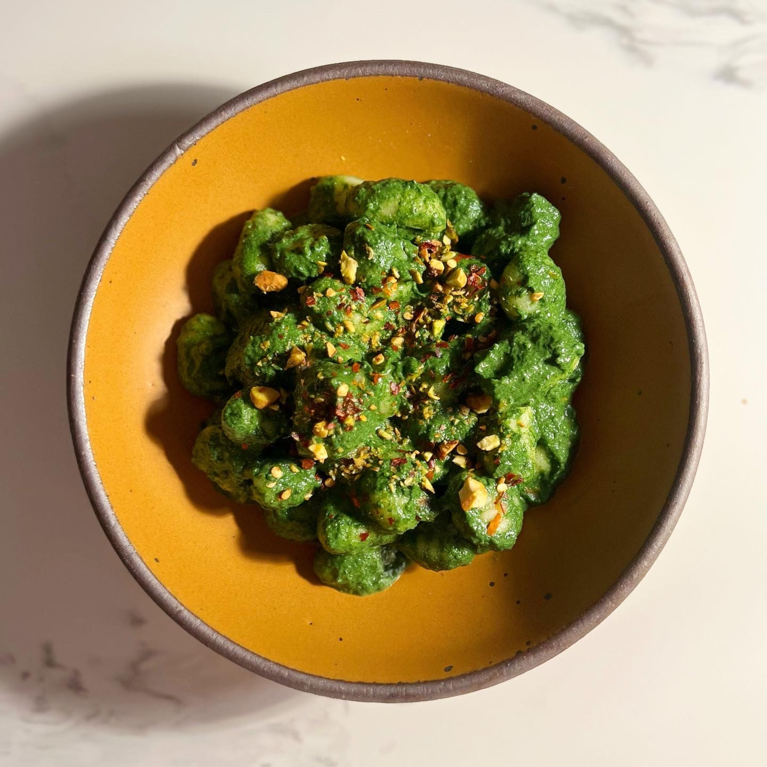 Pillowy Potato Gnocchi Recipe with Creamy Kale Sauce